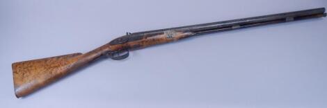 A muzzle loading double barrel shotgun