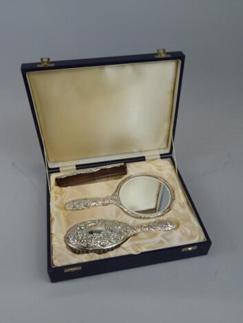 A modern silver dressing table set