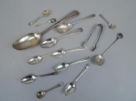 A collection of silver spoons