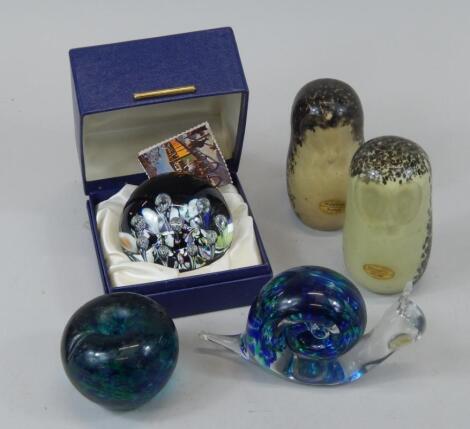 A collection of paperweights