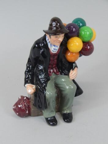 A Royal Doulton figure of the Balloon man