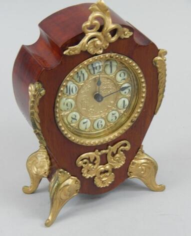 A 20thC mahogany and gilt metal Continental style mantel clock