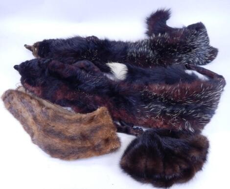 Various fox fur stoles.