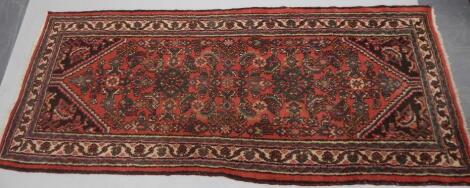 A Persian style rug