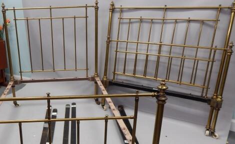 A pair of late 19thC / early 20thC brass single beds