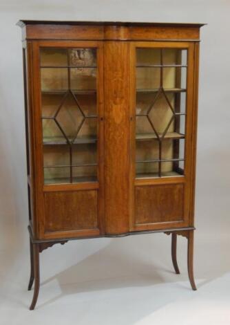 An Edwardian mahogany and marquetry display cabinet