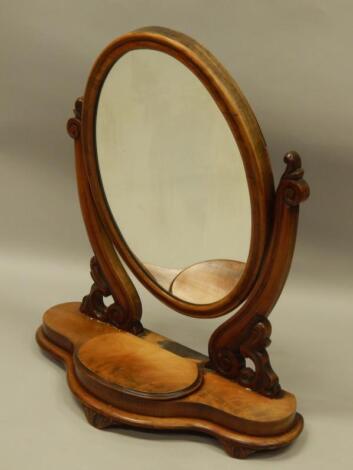 A Victorian figured mahogany dressing table mirror