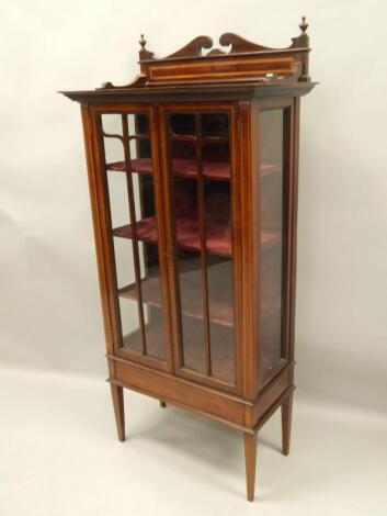 An Edwardian mahogany and satinwood cross banded display cabinet