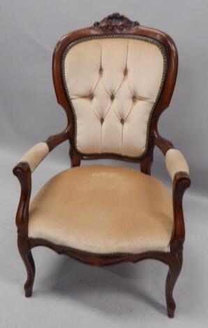 A Continental stained beech open armchair