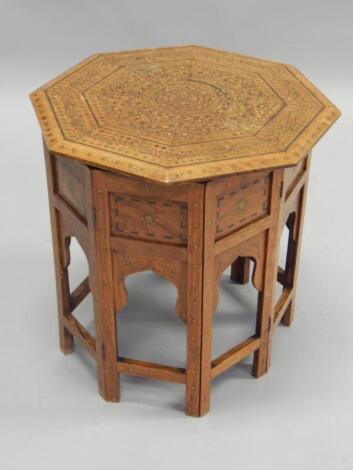 An early 20thC Indian hardwood occasional table