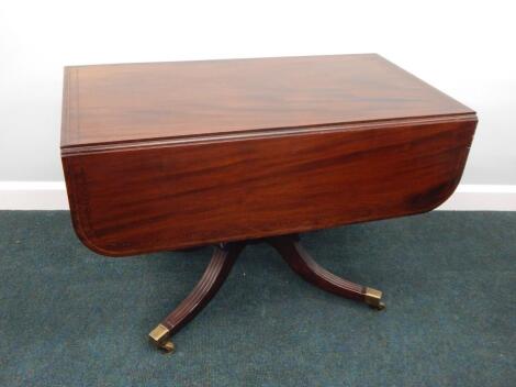 An early 19thC mahogany and chequer banded Pembroke table