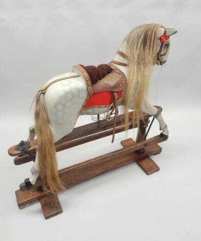 An early 20thC Lines Limited dapple grey rocking horse