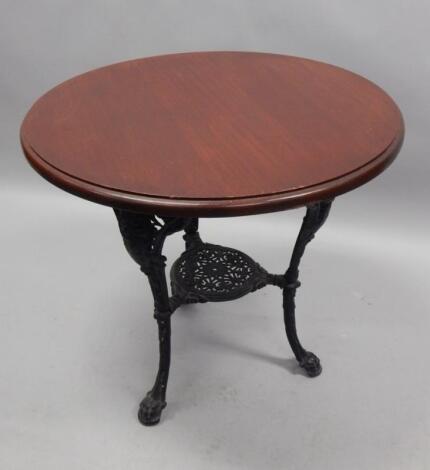 A cast iron Britannia pub table