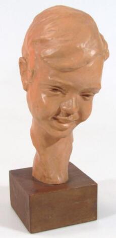 *Paul Serste (1910-2000). A bust of a smiling child