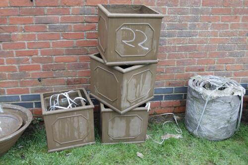 Four various boxed planters.