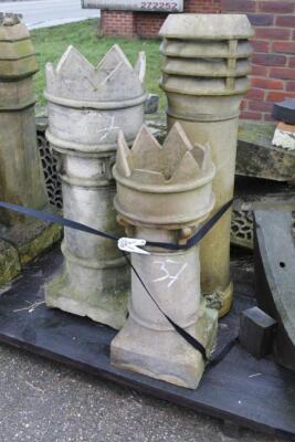 Three various terracotta chimney pots. (AF)