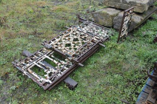 A quantity of cast iron wall trellis.