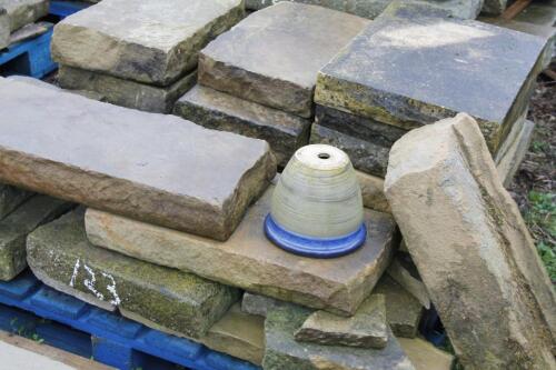 A quantity of sandstone kerbing and blocks.