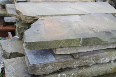 A quantity of sandstone kerbing and blocks.