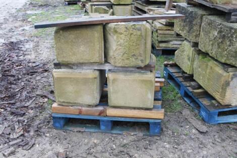 Four various sandstone blocks.