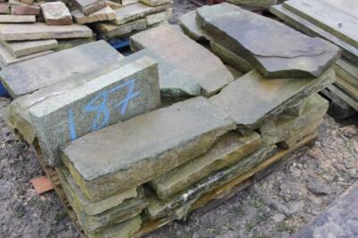 A quantity of sandstone kerbing.