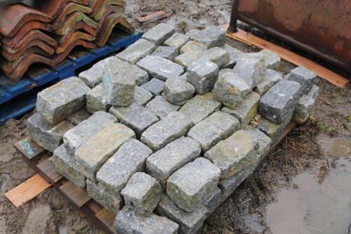 A quantity of granite setts.