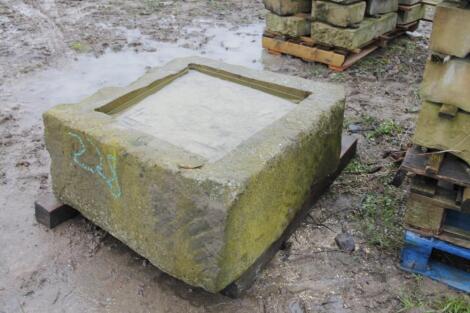 An impressive sandstone pad stone carved as a trough.