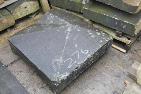 A large granite end block.