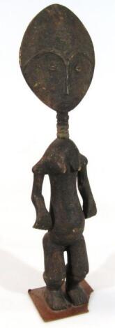A 20thC carved African tribal figure
