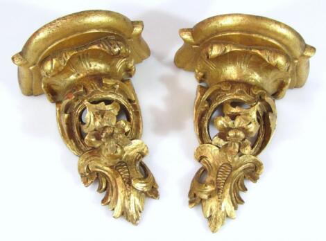A pair of 20thC gilt wood wall sconces