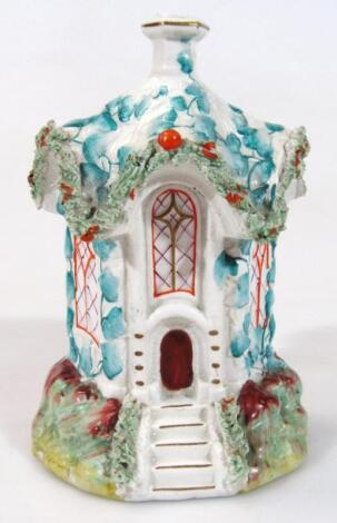 A 19thC Staffordshire pottery cottage money box