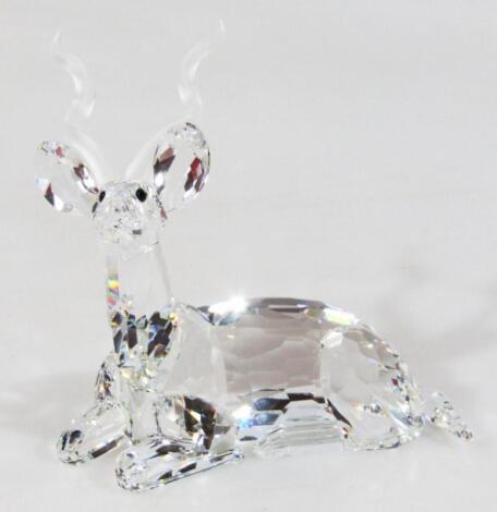 A Swarovski Crystal recumbent stag