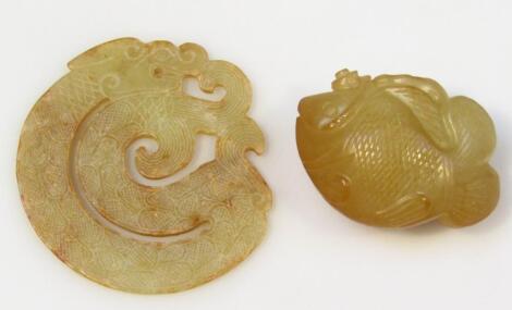 A heavily carved green jade fish