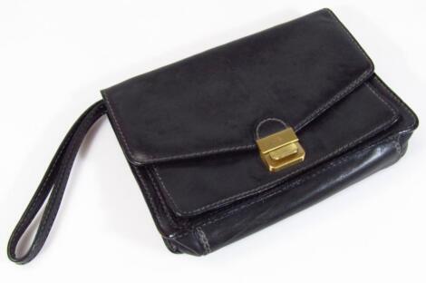 A modern The Bridge black leather messenger style purse