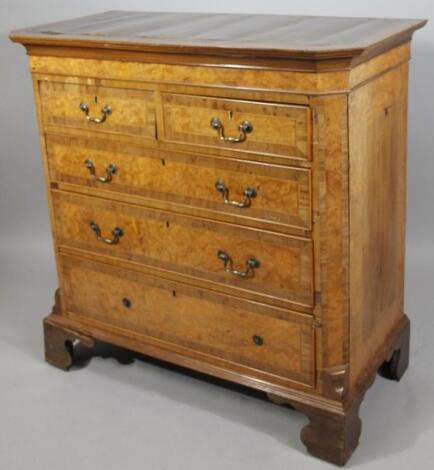 An early 19thc burr walnut mahogany and oak cross banded chest