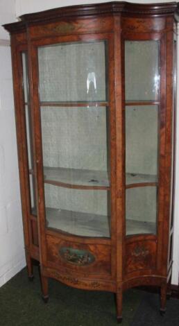 An early 19thC neoclassical satinwood display cabinet