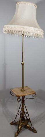 A late 19thC brass standard lamp