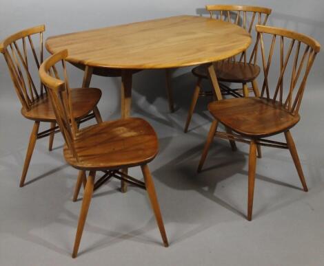 A mid-20thC Ercol style light wood dropleaf table