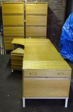 A light wood filing cabinet style three drawer tool chest