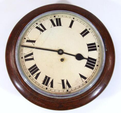 An early 20thC oak cased wall clock