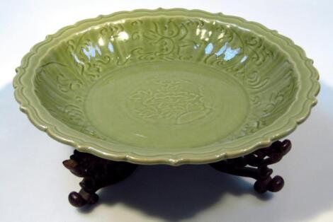 A Chinese porcelain celadon dish