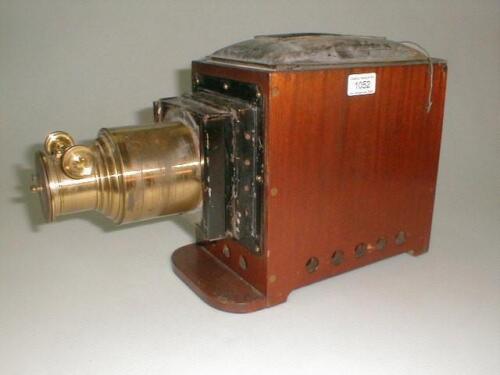 A late Victorian mahogany cased magic lantern projector