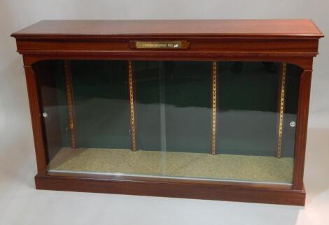 A mahogany display cabinet