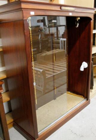 A mahogany display cabinet