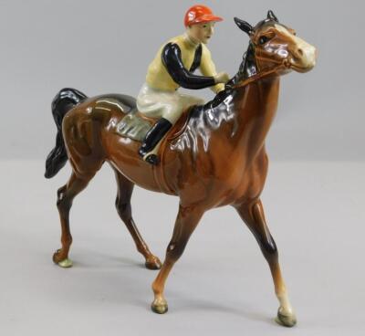 A Beswick ceramic model of a racehorse and jockey