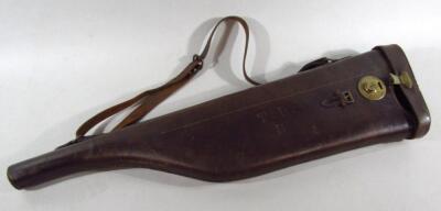 A leather leg of mutton gun case