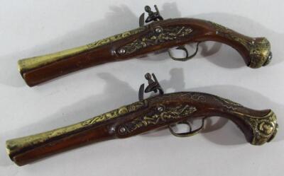 A pair of replica brass and walnut flint lock pistols - 2