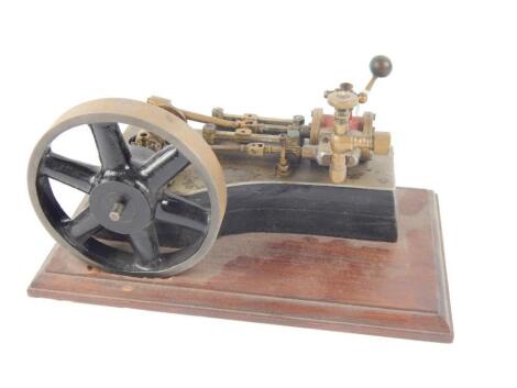 A partial horsepower live steam table top stationary engine