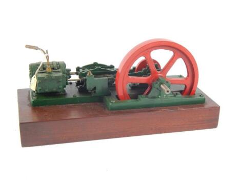 A live steam partial horsepower table top stationary engine