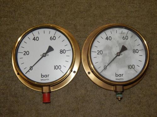 Two brass pressure gauges